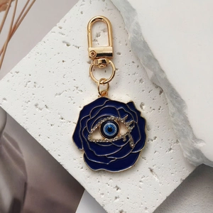 French vintage blue enamel rose and evil eye keychain with gold finish lobster clasp