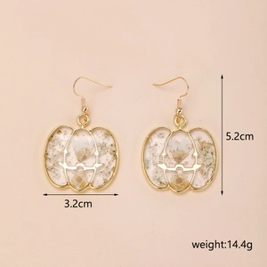 Détails des boucles d'oreilles citrouille avec dimensions 3,2cm sur 5,2cm de haut