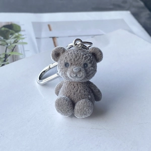 Porte-clés mignon ours en peluche gris foncé floqué avec crochet en métal argenté