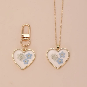 Blue dried forget-me-not flower heart pendant necklace and keychain set in gold metal