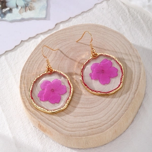 Chic handmade resin earrings with natural dried purple flowers and gold alloy frames