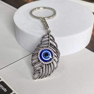 Rétro Alliage Creux Plume Mauvais Œil Porte-Clés Pour Femmes Hommes Œil Bleu Pendentif Strass Porte-Clés Mode Bijoux Sac
