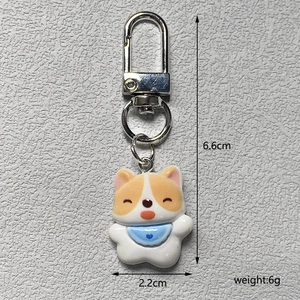 Detailed view of the 6.6cm cartoon Corgi keychain showing dimensions and resin texture