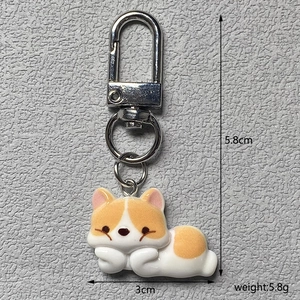 Detail view of the Corgi dog keychain with measurements 5.8cm height and 3cm width