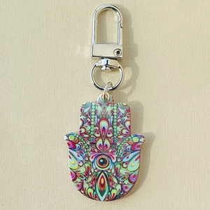 Ethnic Hamsa Hand keychain featuring colorful mandala patterns and silver metal clasp