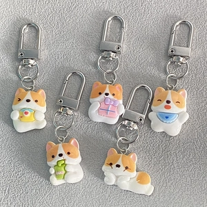 Set of five cute resin Corgi puppy keychains with metallic lobster clasps for bags