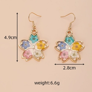 Detail of cherry blossom earrings with dried flowers, 4.9cm height and 2.8cm width