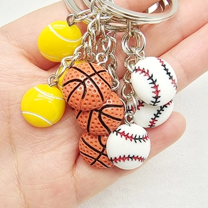 Mini resin sports keychains featuring realistic 3D tennis, basketball, and baseball designs