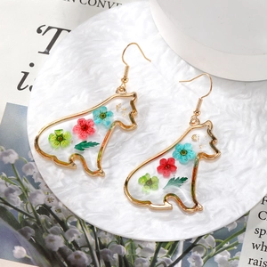 Handmade resin bear earrings with colorful dried flowers and gold foil accents