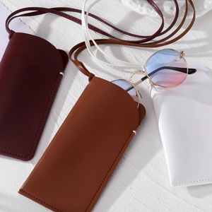 Leather glasses case necklace in burgundy, caramel and white with long neck strap