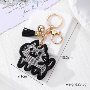 Détails des dimensions du porte-clés chat en strass avec pompon noir et cloche dorée