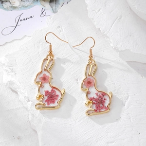 Handmade rabbit shaped earrings with pink dried flowers and elegant golden frames