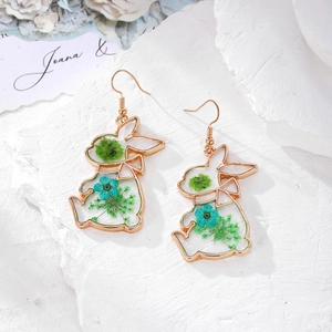 Floral rabbit resin earrings with real dried flowers and gold frame in nature style