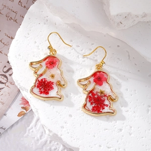Boucles d'oreilles lapin dorées avec fleurs séchées en résine et cristaux