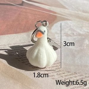 Detailed view of 3cm white flocked swan keychain pendant with size and weight metrics