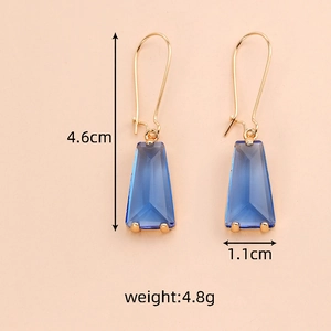 Minimalist geometric trapezoid earrings with blue crystal inlay and gold hooks