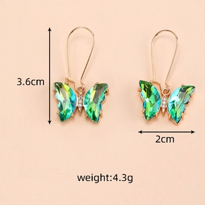 Detailed view of crystal butterfly earrings with 3.6cm height and 2cm width measurements