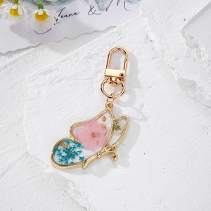 Bohemian butterfly resin keychain with natural dried flowers and gold foil elements