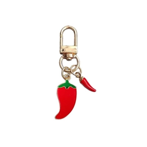Charming red chili pepper keychain with vibrant enamel finish and gold metal hook