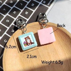 Lot de porte-clés chat en résine avec pendentifs bleu et rose, hauteur de 6,2 cm
