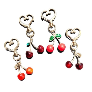 Realistic cherry heart keychains in four red shades with resin fruit and metal clips