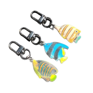 Three-piece set of colorful tropical fish fabric keychains with silver lobster clasps