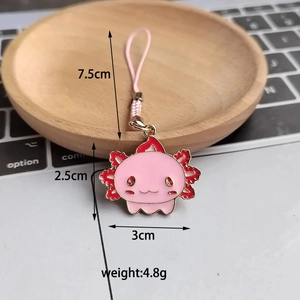 Detail showing dimensions of the pink axolotl alloy keychain with size and weight labels
