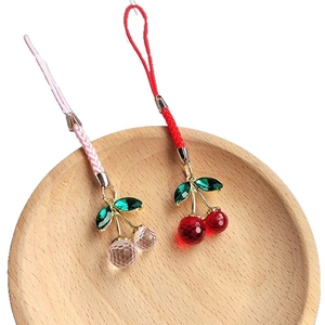 Handmade cherry fruit keychains with faceted crystal beads and green leaf charms