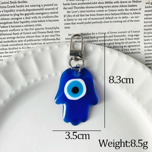 Blue resin Evil Eye and Hamsa hand keychain pendant with silver metal lobster clasp
