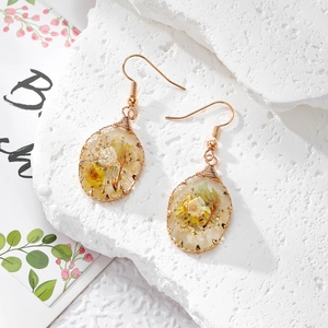 Handmade resin teardrop earrings with real dried flowers and gold wire wrap details