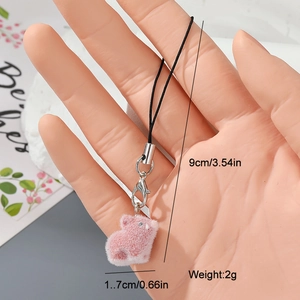 Detail showing the 9cm pink flocked pig keychain dimensions and lobster clasp