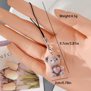Detail of light purple flocked bear charm with pink heart and measurements 9.7cm length