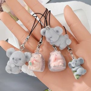 Cute flocked animal keychains featuring koalas and a hedgehog with metal lobster clasps