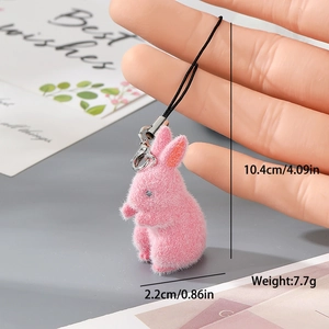 Pink flocked bunny charm keychain size measurements of 10.4cm length and 2.2cm width
