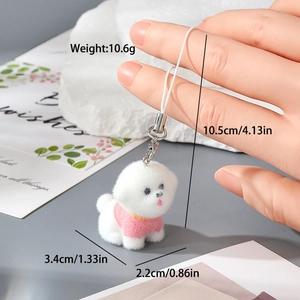 Détail des dimensions du porte-clés chiot floqué blanc avec son petit pull tricoté rose
