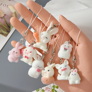 Cute flocked resin rabbit keychains with various poses and colorful carrot accents