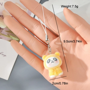 Detail showing dimensions of panda plush keychain with measurements of 9.5cm length and 7.5g weight