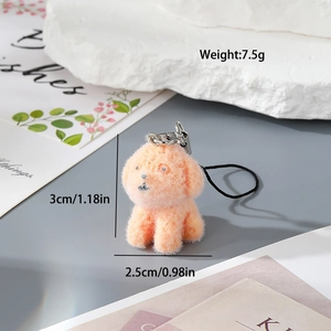 Détail montrant les dimensions du charme chiot rose floqué avec fermoir en argent