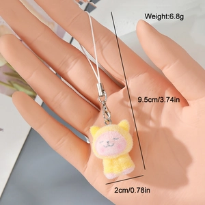 Close-up of yellow flocked animal keychain with detailed weight and size measurements
