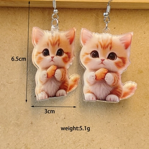Detail view of ginger cat acrylic earrings with measurements 6.5cm height and silver hooks