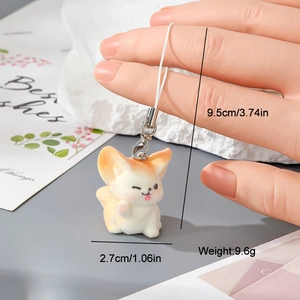 Detail showing a 2.7cm flocked fox charm with dimensions and metal clasp attachment