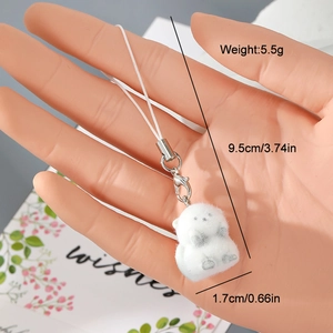 Detail showing white flocked animal keychain with silver lobster clasp and size dimensions