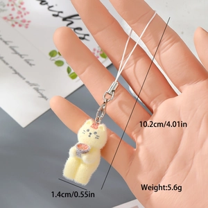 Detailansicht eines 10,2 cm gelben Katzenanhängers mit Maßen für Handy- und Taschenschmuck