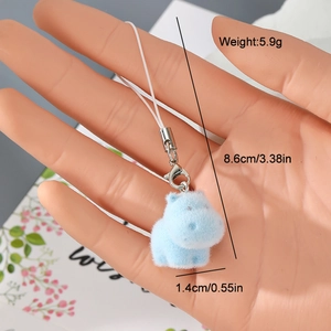 Detailed view of light blue flocked hippo keychain with lobster clasp weighing 5.9 grams