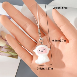 Detail view of a white flocked sheep keychain with exact size and weight dimensions