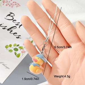 Detail of yellow flocked duck keychain with dimensions shown at 9.5cm length and 1.9cm width
