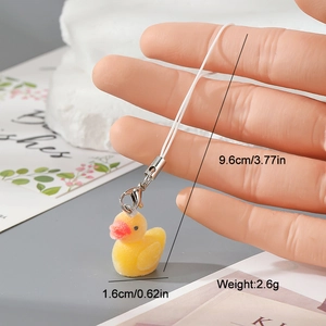 Detail showing dimensions and weight of the yellow flocked duck keychain with metal clasp