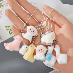 Cute alpaca plush keychain with soft fur texture in pastel colors and silver lobster clasp