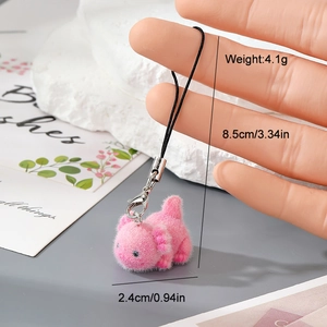 Pink axolotl flocked keychain with black lanyard and metal hook showing size and weight