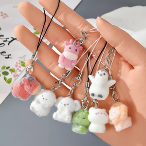 Cute flocked animal keychain collection featuring polar bears and lions with metal lobster clasps